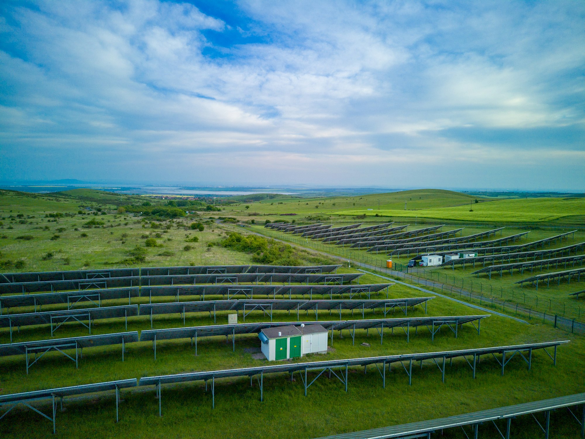 Solar panels to generate energy from the sun's rays are installed in the meadows